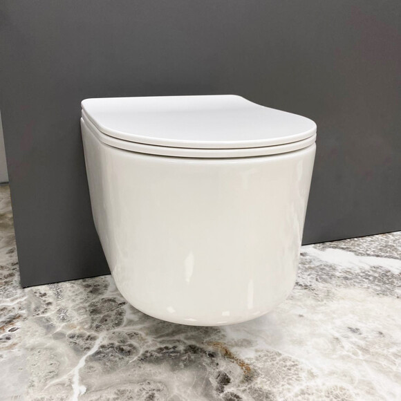 Безободковый подвесной унитаз VBI Tino White VBI-020600 (с сиденьем), фото 