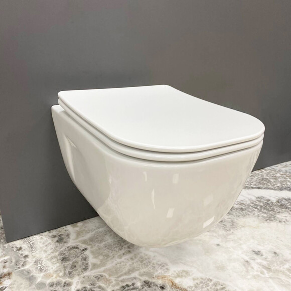 Безободковый подвесной унитаз VBI Lido White VBI-020500 (с сиденьем), фото 